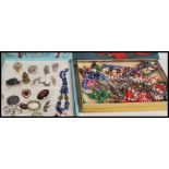 A collection of vintage 20th century costume jewellery to include necklaces, brooches to include