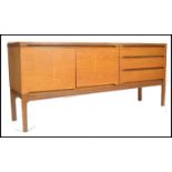 A good mid century solid teak wood sideboard of good proportions and Danish influence by Meredew.