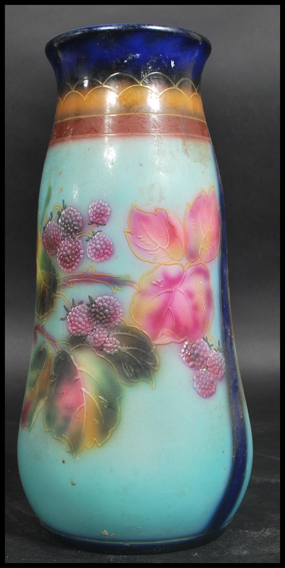 A good 19th century tube lined vase with decoration of grape and vine by Royal Bonn Germany. Further