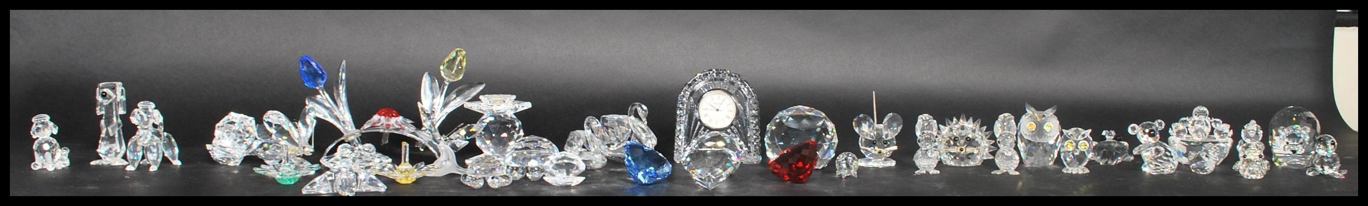 A good extensive collection of Swarovski crystals to include polar bear, mice, butterflies, frogs,