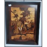 A vintage 20th century picture made entirely from sample woods the picture depicting elephants in