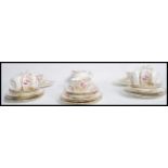 A late 19th century Staffordshire bone China tea service consisting of cups, saucers, side plates,