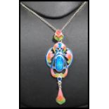 A sterling silver and enamel necklace chain having an art nouveau style drop pendat with bolt ring