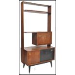 Eric Gomme for G-Plan, a 1950's mid century room divider, with shelf and cupboard arrangement