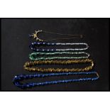 A group of early 20th century Art Deco necklaces of faceted glass bead form.