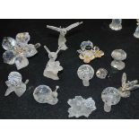 A group of Swarovski miniatures to include snails, bees and dragonflies.