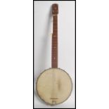 A vintage early 20th century  4½ string banjo with mother of pearl star and dot inlay to the