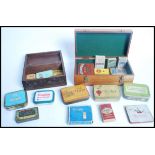 A good group of vintage 20th century cigarette tobacco smoking related boxes packets and tins to