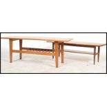 Two vintage / retro 20th century teak wood coffee tables of low form, one raised on tapering legs