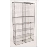 A 20th century large galvanized metal cage Industrial shoe rack / filing storage cubby cabinet. Of