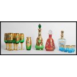 A collection of retro 20th century vintage Italian Murano style Venetian gilded coloured glass to