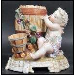 A 19th Century Meissen porcelain figure group - spill vase. The figurine depicting a Cherub  in