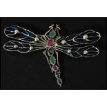 A large sterling silver and plique a jour brooch in the form of a dragonfly with pearl set wings and