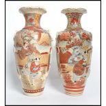 A good pair of early 20th century Japanese Satusuma ware vases having waisted necks with trumpet