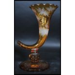 A 19th century yellow glass cornucopia vase raised on plinth base with stunning acid etched