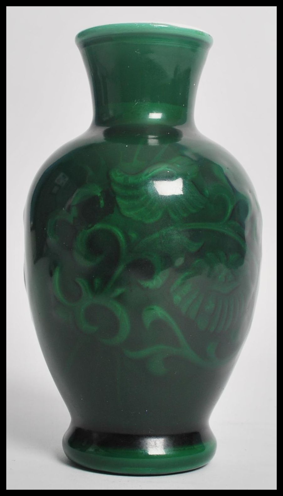 A Chinese cameo / Peking glass vase, 19th/20th century, of ovoid form. The opalescent white glass