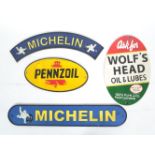 A group of vintage style cast iron advertising point of sale motoring / oil sign plaques to