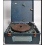 A vintage mid 20th century Pye Collaro portable record player radio gram housed within a vinyl