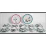 A matching service of Chinese Republic period hand painted cups saucers and plates depicting