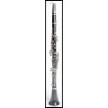 A vintage 20th clarinet by Boosey and Hawkes having silver white metal keys. English made.