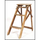 A pair of vintage industrial folding wooden  step ladder / library steps / shop ladder,  pine wood