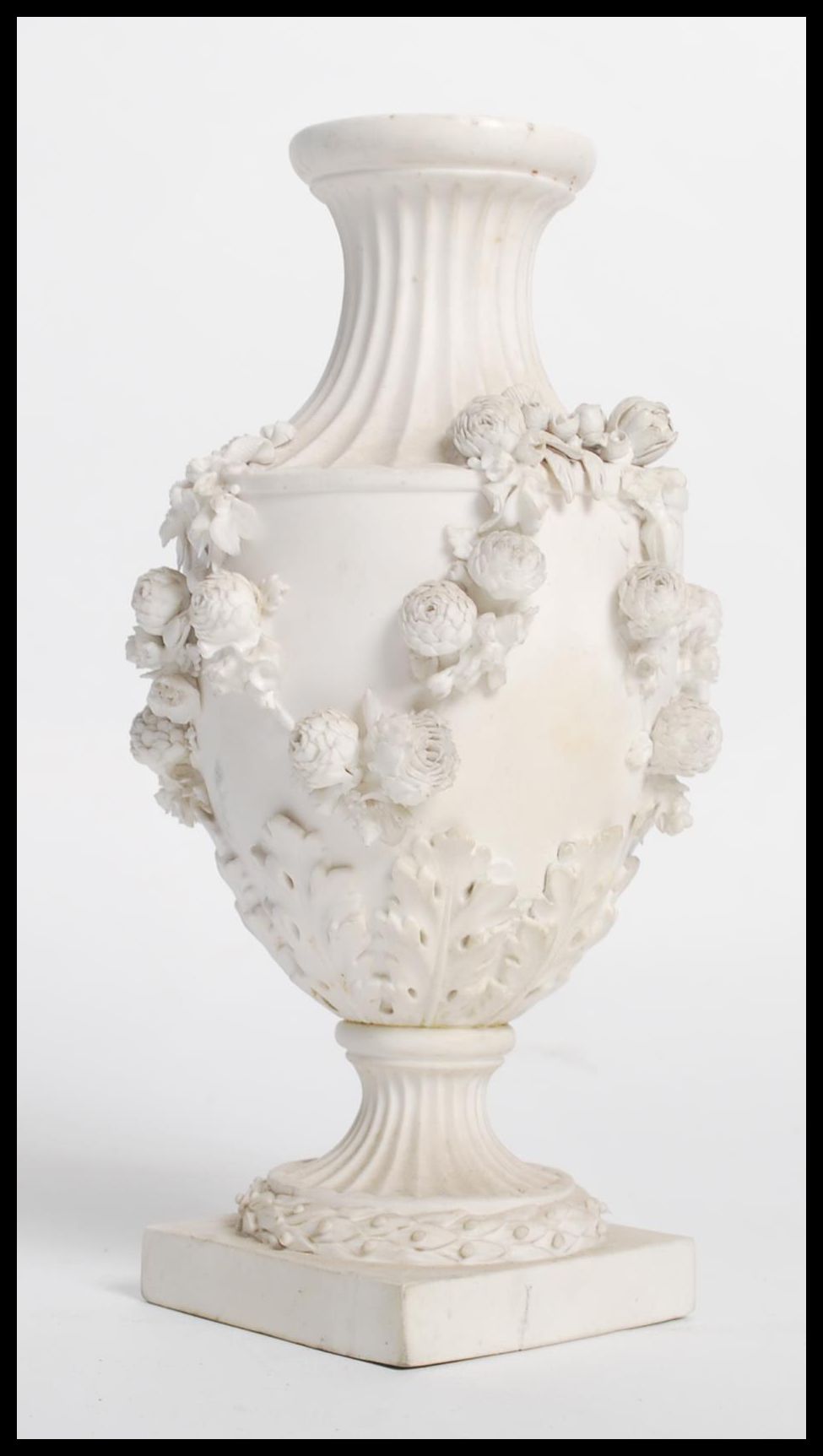A 19th century Derby parian bisque ware vase raised on a square base with relief decoration of - Image 2 of 6
