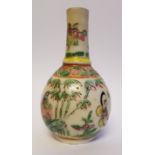 A 19th century Chinese Canton famille rose miniature vase decorated with flowers  and birds being