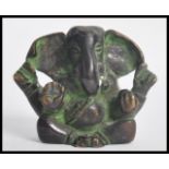 A 19th century Indian bronze figurine of Ganesha the God of Beginnings modelled in a seated