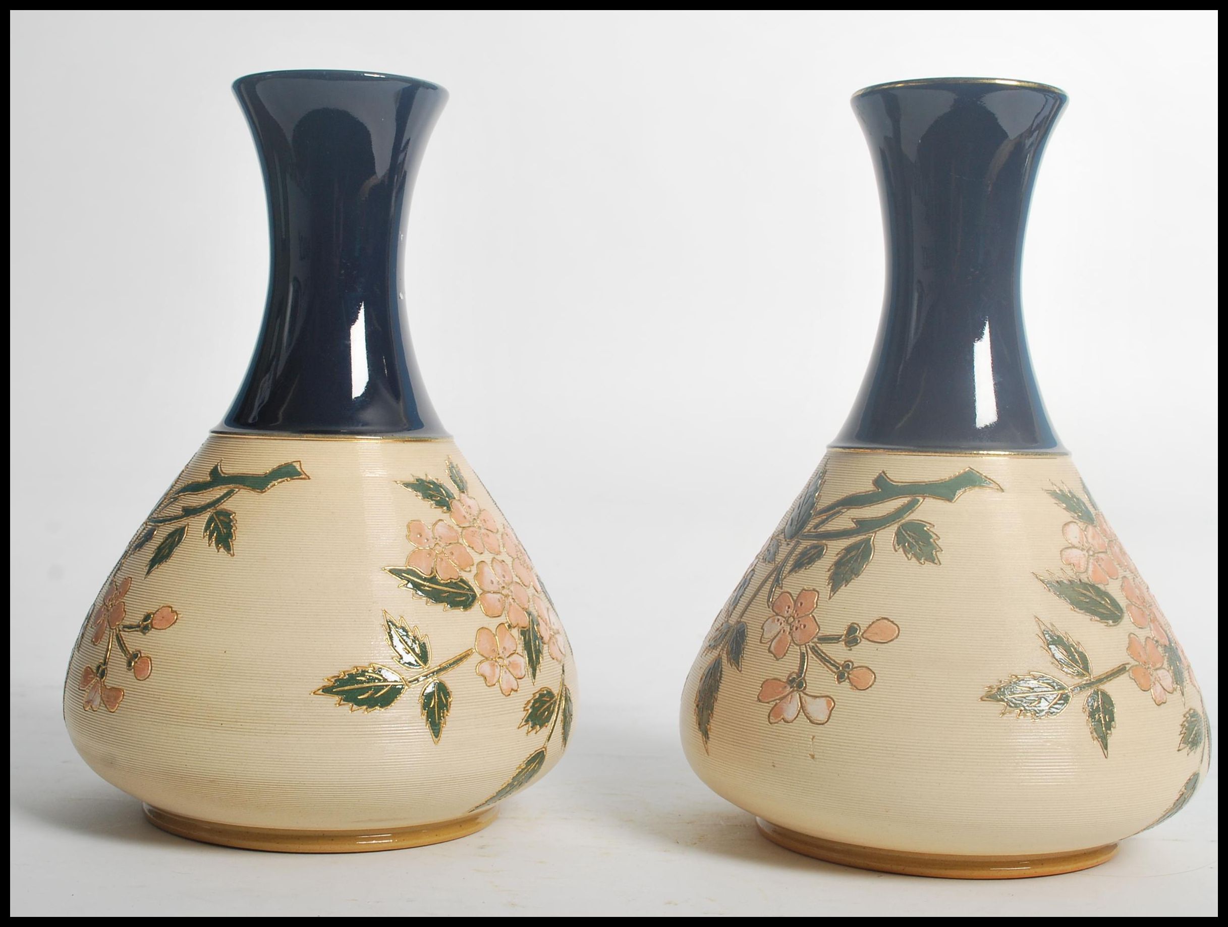 A pair of early 20th century Langley Mill stone wear vases having cobalt tapering necks with - Image 2 of 7