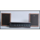A 1970's Sharp Hi-Fi stereo system with black facia and turn dials together with the associated