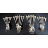 A set of 24 Mappin and Webb A1 silver plate cutlery set consisting of 12 spoons and 12 knives (six