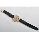 A vintage mid century Titus, Geneve gentleman`s 18ct / 750  gold chronograph wristwatch. The watch