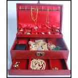 A good collection of vintage and retro costume jewellery to include pearl necklaces, brooches,