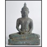 A 19th century Oriental Chinese bronze figurine of