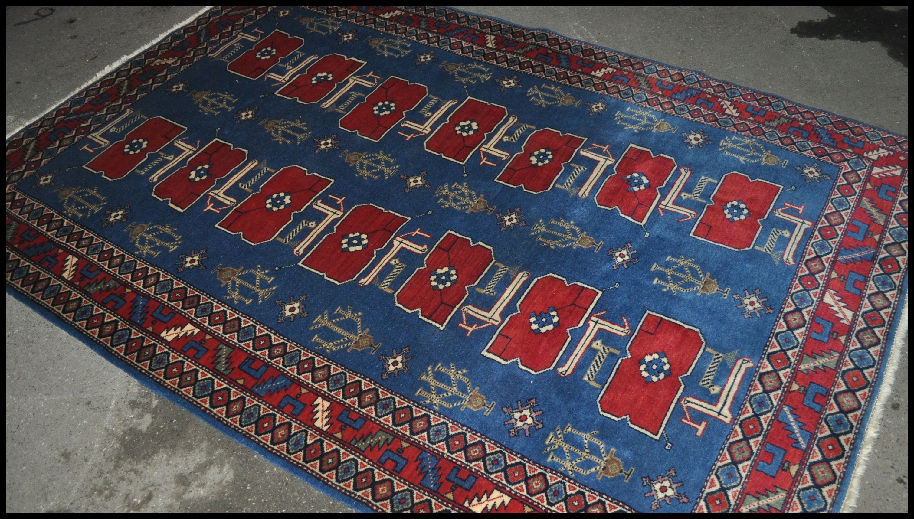 A 20th century handmade Persian carpet rug of wool