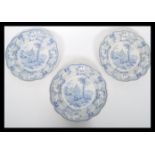 A set of three 19th century blue and white ceramic transfer printed Surseya Ghatt Khanpore plates of