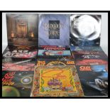A collection of long play LP vinyl rock records featuring various artists to include Def Leppard,