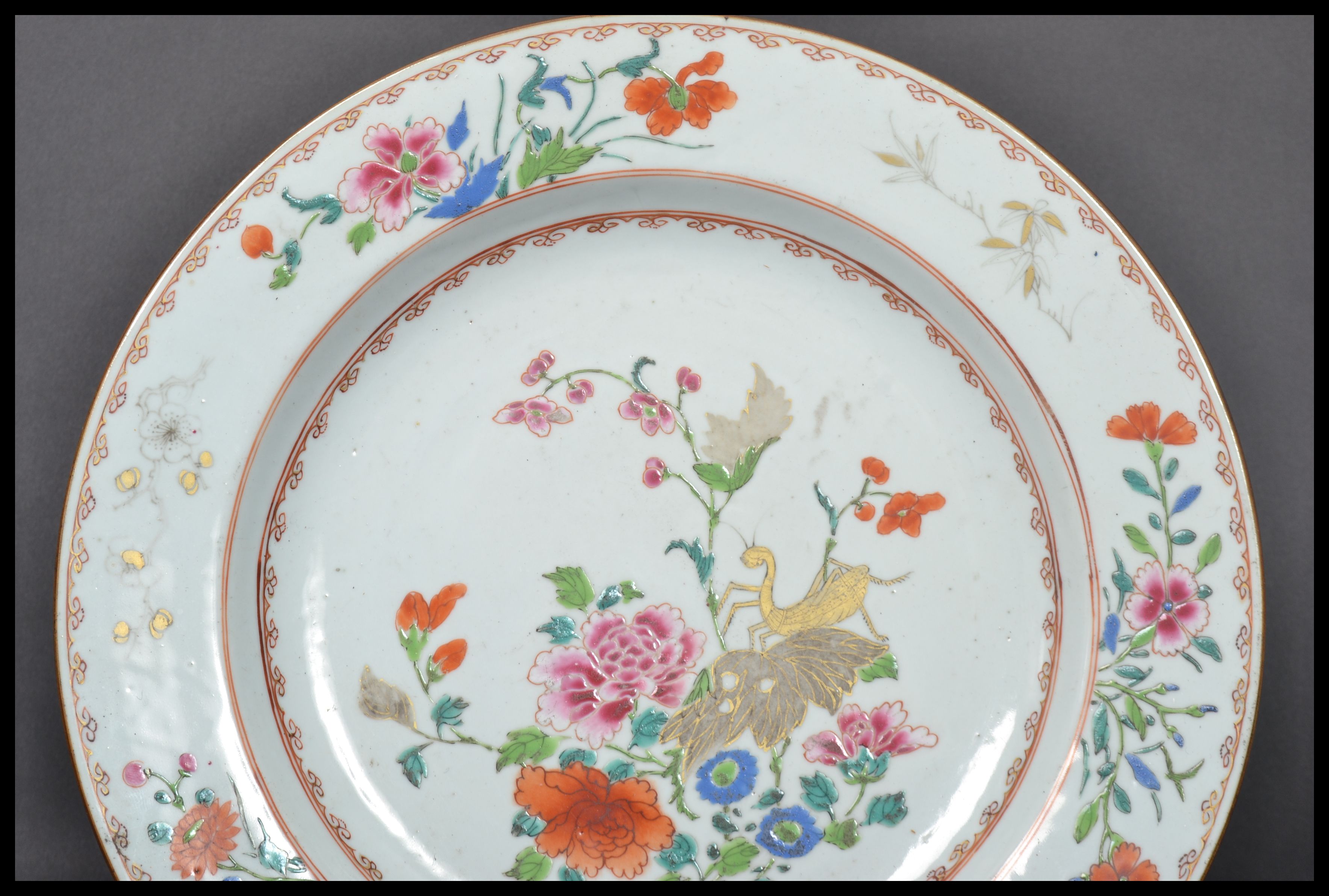 An 18th century Chinese Qing Long Famille Rose plate hand painted with enamels depicting floral - Image 4 of 8