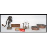 A collection of vintage items to include a silver plated brandy warmer and glass, a group of