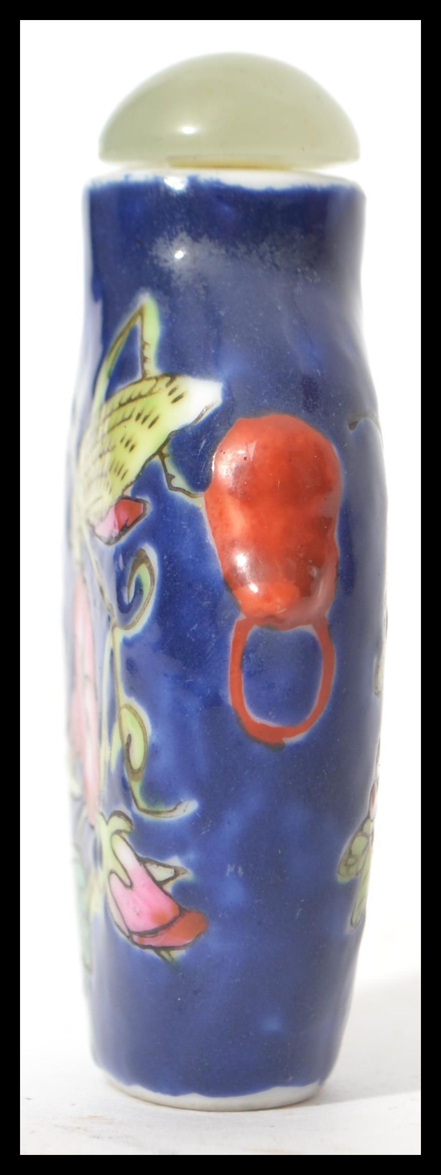 A Chinese porcelain snuff - perfume bottle with glass stopper with dabber stem. Blue ground with - Image 2 of 7