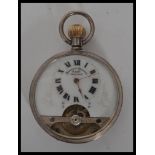 An early 20th century French silver pocket watch bearing London import marks. The white enamel
