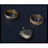 Two vintage ladies hallmarked 9ct hallmarked gold rings, one band ring and the other with chase