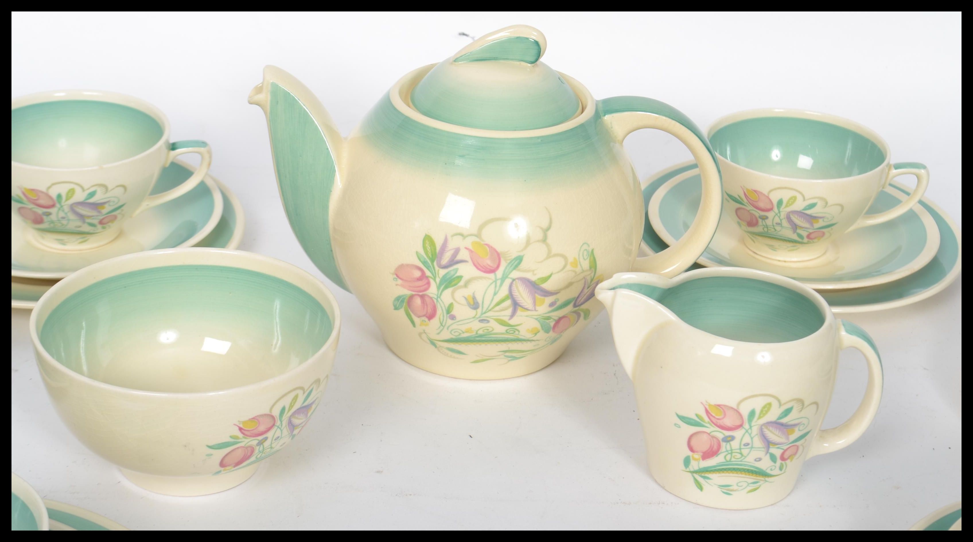 A 1930's Susie Cooper Dresden Spray six person tea service set consisting of six cups saucers and - Image 3 of 6