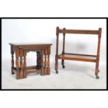 A 1930's Queen Anne revival side table together with an oak nest of tables in the Jacobean revival