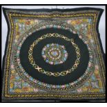 An early 20th century Indian wall hanging having a cotton back with silk threads. The design of