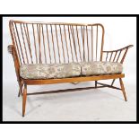 A mid century  Ercol ' Windsor ' pattern three seat sofa settee,  with tapestry William Morris