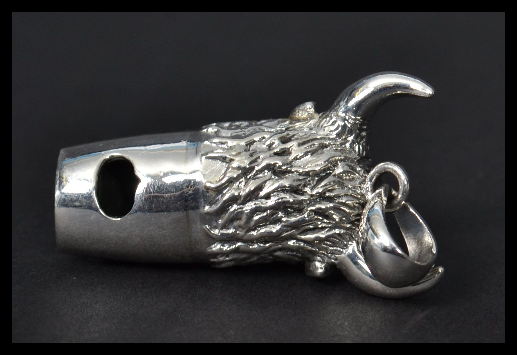 A sterling silver whistle in the form of  a bulls head with horns and bail loop. Weighs 17 grams. - Image 4 of 6