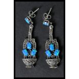 A pair of sterling silver and opal marcasite drop earrings in the Art Deco style. Weighs 9. 7