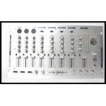 KAM - An audio pro 1500 mixer. Measures 26.5 cm high.