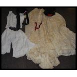 A small collection of ladies clothing dating from the 19th century to include 19th century Victorian